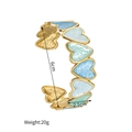 Vue détaillée du bracelet jonc cœur en émail montrant le diamètre 6cm et la largeur 2,1cm - Bleu