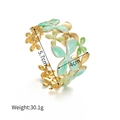 Detail van 18k gouden bloemenarmband met 5,7cm binnendiameter en een gewicht van 30,1g - Bloem