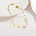 Bracciale da donna in acciaio inossidabile placcato oro 18K con ciondoli sole e Saturno - Astronauta Sole Pianeta