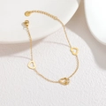 Bracciale in acciaio inossidabile placcato oro 18k con ciondoli a cuore e zirconi - Tre Cuori