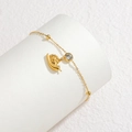 Bracelet minimaliste plaqué or 18 carats avec pendentif escargot et pierre zircon brillant - Style Escargot Doré