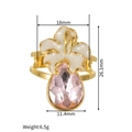 Detailed size specifications for flower ring with pink teardrop crystal and gold plating - Adjustable Open / Gold