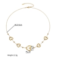 Dettaglio della collana a cuore traforato in oro 18k con dimensioni e peso esatti - Oro