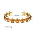 Detail van de geëmailleerde schildpad armband met 18k gouden plating en maten - Goudgeel