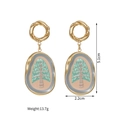 Detail of 18k gold plated oval earrings with green tree motif and hook closure - Gold