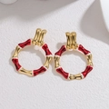 Bamboo-style 18k gold plated stainless steel hoop earrings with red and white enamel - Red