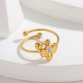 Macro shot of 18k gold open ring with bee charm and sparkling cubic zirconia stone - Bee Style