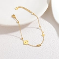 Bracciale in acciaio inossidabile dorato con ciondoli a cuore, chiave e lucchetto con zirconi - Chiave Lucchetto a Cuore