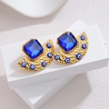 Orecchini retrò in oro martellato con zircone blu e perline malocchio - Blu