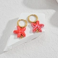Golden hoop earrings with red ceramic starfish charms and white dots for beach style - Bright Red Starfish