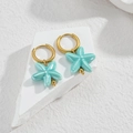Exquisite gold hoop earrings with blue starfish ceramic pendant on white stone - Sky Blue Starfish
