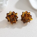 Macro view of tortoiseshell resin flower earrings with golden bead center and 18k plating - Multi-Layer Small Petal