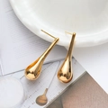 Minimalist large gold waterdrop earrings with a polished mirror finish on a white tray - 18K Gold / Gold