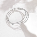 Set van drie zilveren roestvrijstalen armbanden met een getextureerde afwerking - Zilveren Gehamerde Textuur (CXB1252-01)