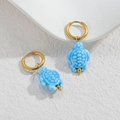 Sky blue sea turtle ceramic earrings with gold circular hoops in a summer ocean style - Lake Blue Sea Turtle
