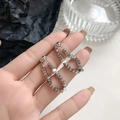 Gepolijste zilveren metalen ketting oorbellen met minimalistisch geometrisch design - Zilver