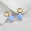 Gold-plated hoop earrings featuring light blue turtle pendants for a summer beach look - Pale Blue Sea Turtle