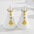 Golden sea fish earrings with green beads and white pearls hanging on jewelry stands - Yellow Fish Style (M-E1124-huang)