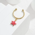 Golden starfish earring with pink enamel pendant on a white minimalist display - Starfish Style (M-R864) / Red
