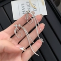 Detailed view of silver abstract streamline earrings in a modern minimalist design - Silver (A0633A)