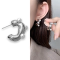 Irregular C-shaped silver earrings with embedded pearls shown on white background and model - Silver Style (A0616C)
