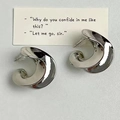 Artistic twisted silver plated stud earrings with high mirror finish on a clean background - Silver (b325)