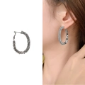 Silver-toned hoop earrings featuring sparkling rhinestones and oval metal sequins - Silver