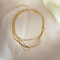 Dettaglio della collana a catena serpente dorata multistrato con chiusura regolabile - Stile Serpente Multistrato Dorato (A1001-03B) / Placcato Oro 18K / Oro
