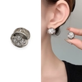 Elegante zilveren bloemoorbellen met vier heldere zirkonen en gepolijste metalen finish - Zilver