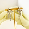 Detail of silver geometric square earrings with sparkling zircon tassel fringe on a stand - Rhombus Tassel Style (A1301-04C) / Silver
