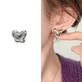Silver liquid metal butterfly stud earrings with high-polish finish on a model - Silver
