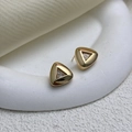 Detail of hollow triangle stud earrings with gold mesh texture on ceramic tray - Gold (A0435A)