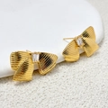 Detailed macro view of gold bow earrings with textured finish and zircon stone center - Gold (A0443A)
