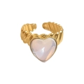 Detail of gold spiral ring featuring a heart-shaped opal stone in a minimalist style - Spiral Texture Heart Moonstone Style (A1901-03C)