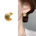 Golden woven texture hoop earrings with intricate metallic braided pattern design - Gold