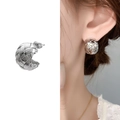 Silver woven texture earrings featuring a half-moon design and modern metallic finish - Silver