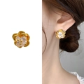 Elegant 18K gold plated flower stud earrings featuring sparkling zircon stone centers - Gold