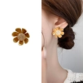 Gold sunflower earrings with white crystal center on Asian model for stylish look - Gold (A0758A)