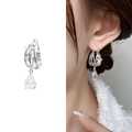 Silver teardrop earrings featuring sparkling zircons and a large transparent pear-cut stone - Bright Silver