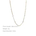 Dettaglio collana dorata a due strati con perle da 5mm, lunghezza 38cm più 5cm estensione - Stile Catenina Sottile Con 8 Perle (A0360B Oro)