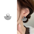 Silver geometric fan stud earrings with wave texture shown on a female model - Silver