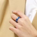 Macro shot of a navy blue geometric faceted ceramic ring worn on the finger - US 6 / Grey Blue Style 2