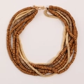 Bohemian multi-layer wooden bead necklace with golden toggle clasp on grey background - Multi-Layer Bohemian Wood Bead Style (X-1153)