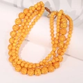 Detail of four-strand yellow beaded necklace with irregular resin beads and metal clasp - Bright Yellow Multi-layer Necklace - No Pendant (X-1018)