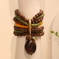 Multilayer bohemian beaded bracelet with wood beads and leopard print pendant detail - Bohemian Multi-layer Beaded Style (S-434)