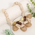 Detailed view of bohemian woven rope necklace with malachite stone pendant and resin beads - White