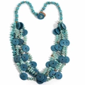 Detail of bohemian layered necklace with deep blue discs and colorful stone beads - Necklace / Blue
