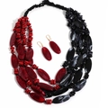 Detail of ethnic multi-layer acrylic beaded necklace and matching earrings in red and black - Red & Black Contrast Necklace + Earrings Set