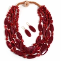 Detail of red multilayer acrylic beaded necklace set with marbled texture on white background - Red Necklace & Earrings Set