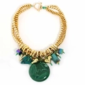 Close-up of golden CCB beaded necklace with large green textured round pendant and charms - Green Malachite Texture (X-1376) / Green